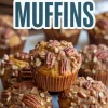 Stacked sweet potato muffins with pecans and oat topping arranged on a marble surface, highlighting their golden-baked texture and rustic presentation.