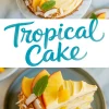Round tropical layer cake topped with mango slices, peach wedges, toasted coconut, and mint leaves, with a slice on a plate beside it.