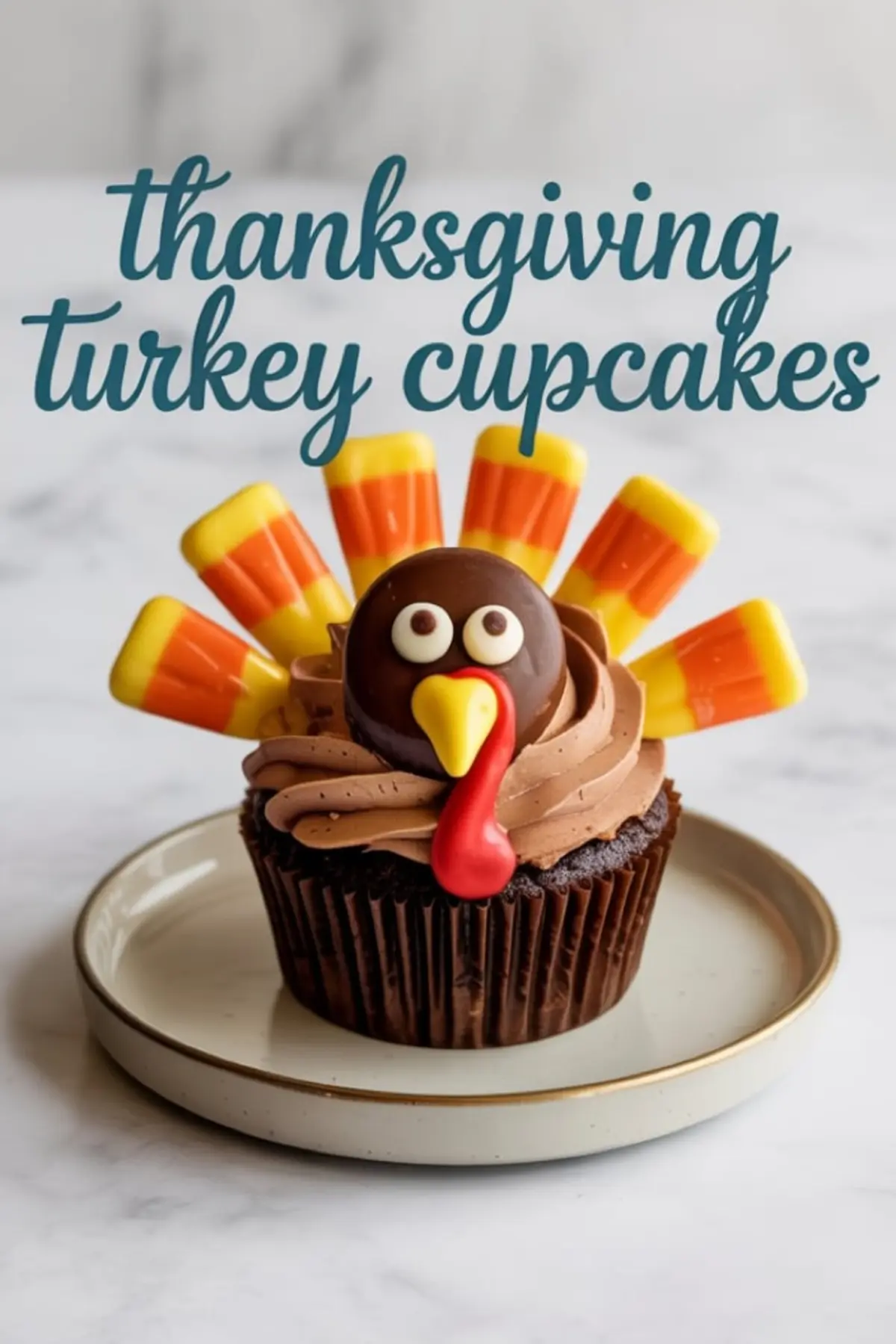 Single chocolate turkey cupcake topped with swirled chocolate frosting and candy corn feathers, placed on a white ceramic plate with a marble background and “thanksgiving turkey cupcakes” text overlay.
