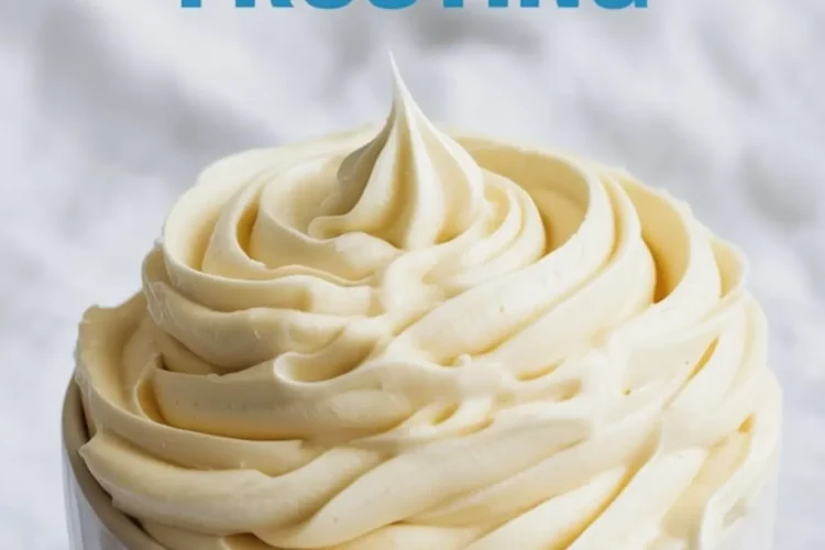 Bowl of fluffy vanilla buttercream frosting piped with ridged swirls, topped with a central peak, with text “How to Make Buttercream Frosting” above.