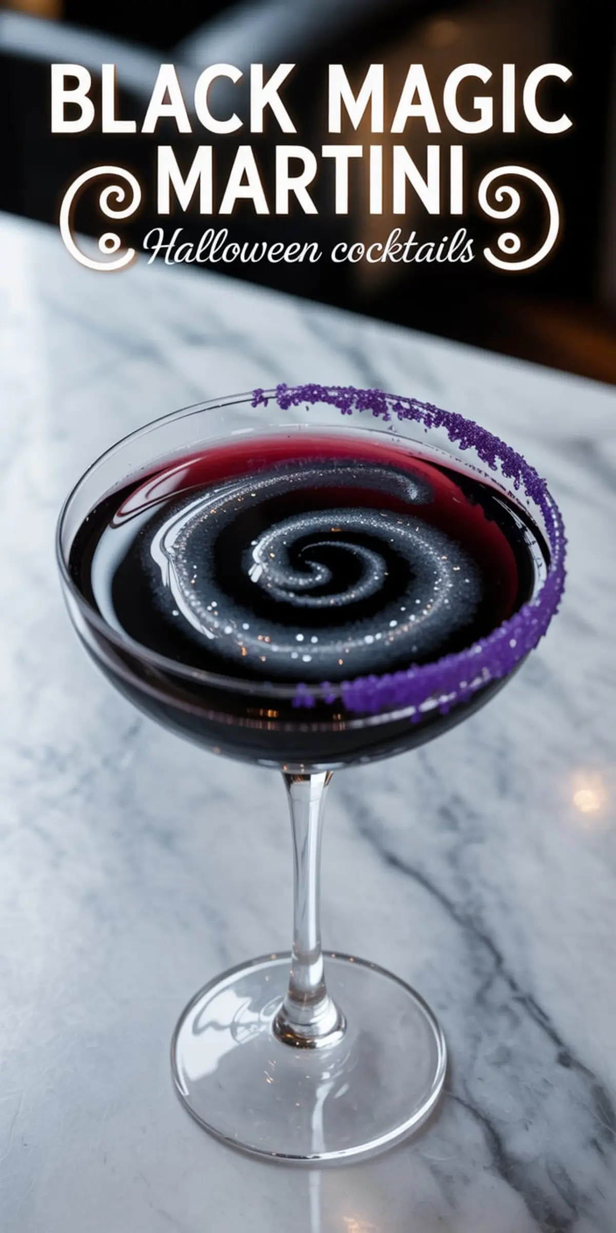 Dark Halloween martini with a cosmic spiral swirl and deep red tones, served in a glass rimmed with purple sugar crystals, placed on a marble surface with ambient lighting.
