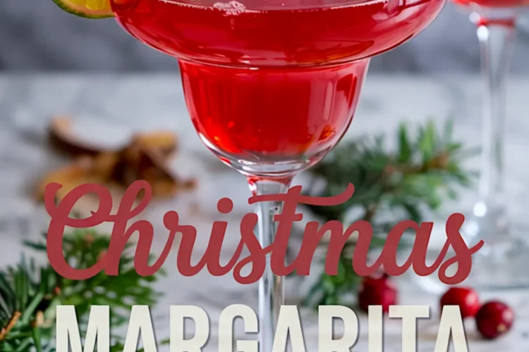 Christmas margarita cocktail in a wide glass with green sugar rim, garnished with a lime wheel and fresh cranberry, surrounded by pine branches and cranberries.