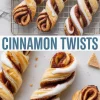 Crispy puff pastry cinnamon twists with caramelized cinnamon-sugar layers, topped with thick icing and displayed on a cooling rack and white background for a cozy baking aesthetic.