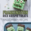 Close-up of Frankenstein Rice Krispie treat with candy eyes, chocolate drizzle hair, and piped mouth details on a marble surface, surrounded by green and white cereal pieces and text overlay for a Halloween recipe.