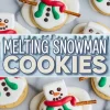 Bright vertical collage presents multiple melting snowman Christmas cookies topped with marshmallow snowmen, green icing scarves and chocolate buttons, separated by an icy blue banner announcing “Melting Snowman Cookies.”