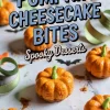 Mini pumpkin-shaped cheesecake bites styled as Halloween treats on a marble surface, surrounded by green ribbon curls, black paper bats, and orange maple leaf cutouts.