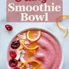 Cranberry orange smoothie bowl topped with dried cranberries, toasted coconut flakes, and fresh orange slices, styled on a white marble background with text overlay promoting the smoothie bowl.