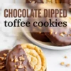 Chocolate-dipped toffee cookies arranged on a plate, with chopped toffee pieces sprinkled over the chocolate coating and bold text overlay labeling the cookies.