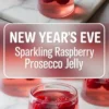 A collage featuring sparkling raspberry Prosecco jelly set in small round molds on a marble surface, each jelly holding whole red raspberries with a glossy finish and a New Year’s Eve party theme.