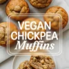 Overhead shot of vegan chickpea muffins on a marble surface with one muffin sliced open on a white plate, showcasing a moist interior and whole chickpeas for a dairy-free, egg-free treat.