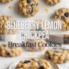 Flat-lay of blueberry lemon chickpea breakfast cookies arranged on parchment paper and a detailed shot of a halved cookie on a white plate. The cookies are packed with plump blueberries, soft chickpeas, and lemon zest for a high-fiber, naturally sweet breakfast option.
