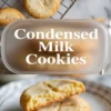 A vertical collage shows golden condensed milk cookies on a cooling rack at the top, centered white “Condensed Milk Cookies” text overlay, and a close view of a cookie split open on a plate at the bottom highlighting a soft buttery texture.