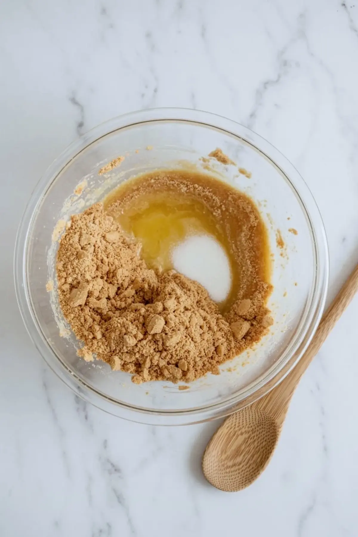 Creamy key lime and coconut filling in a glass bowl for mango coconut key lime bars.