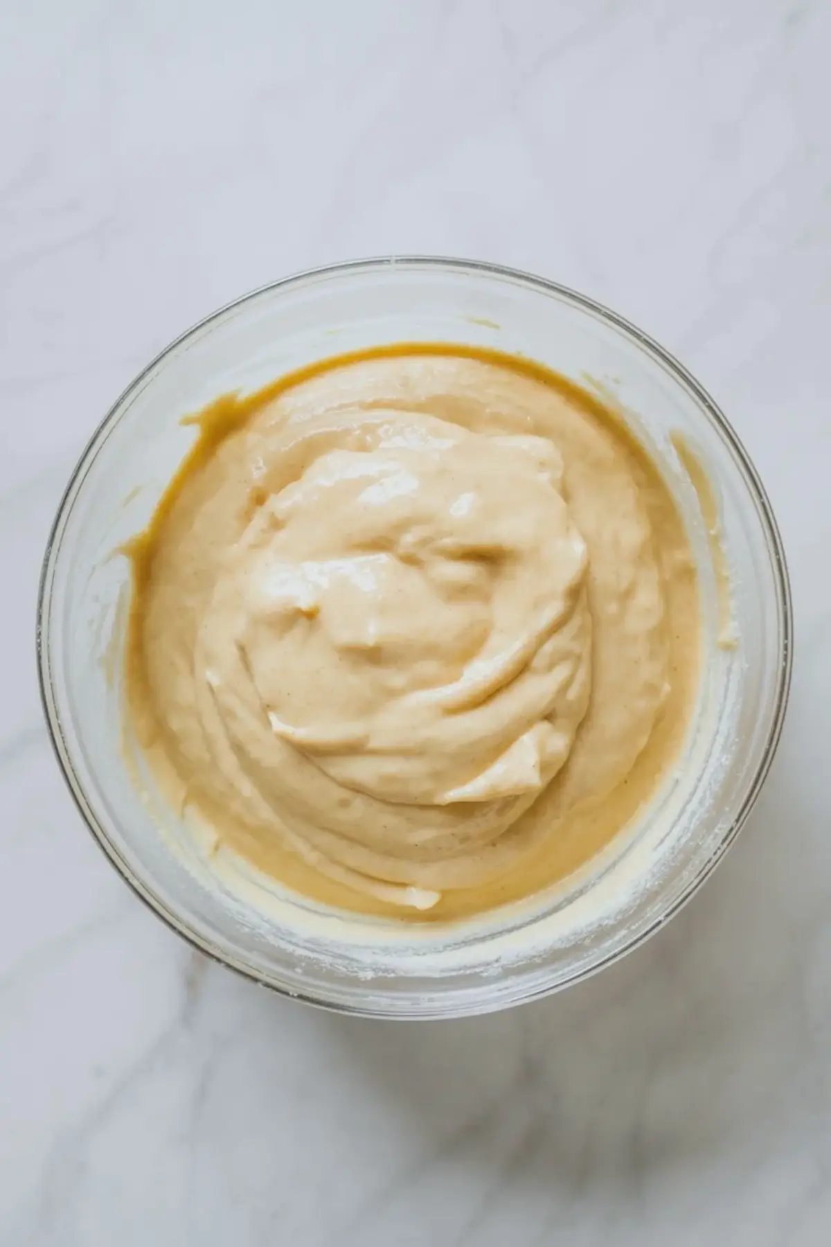 Sheet pan strawberry shortcake cake shown as a vertical text overlay hero image with the frosted sheet cake above and a strawberry filled slice below.