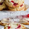 White chocolate cherry cheesecake cookies baked and arranged on a plate with creamy centers and cherry swirls.
