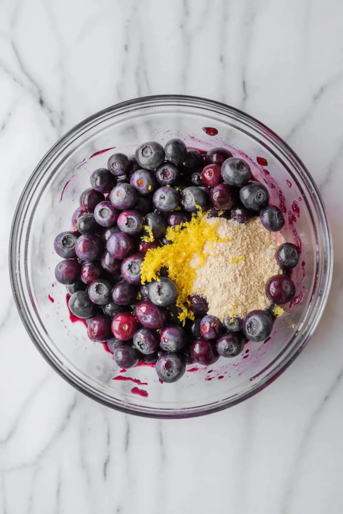 Blueberry cobbler topping mixture in a bowl before baking, showing the soft batter that bakes into the golden cobbler crust.