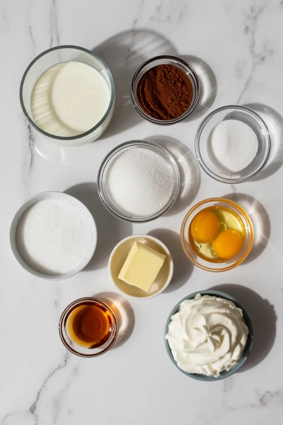 Smooth espresso custard in a mixing bowl for espresso cake filling, showing the thick coffee filling before folding in whipped cream.
