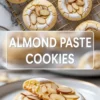 Almond paste cookies with powdered sugar tops and sliced almonds, shown on a cooling rack above a plated split cookie in a tall recipe hero image with text overlay.