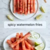 Spicy watermelon fries arranged on a white plate with lime wedges, chili seasoning, yogurt dip, and recipe title text on a white marble background.