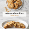 Missouri cookies stacked on a white plate with chopped peanuts scattered around, above a broken cookie showing a chewy center full of roasted peanuts.